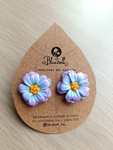 Aros flor petalos corazon celeste