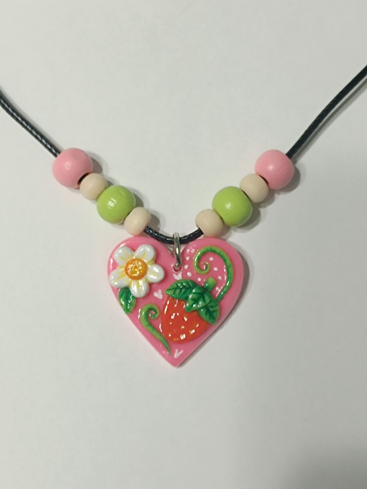Collar corazón frutilla
